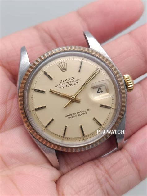 rolex 36 1601 gold bezel.